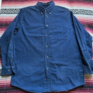 Blue corduroy Consensus button up shirt size M.